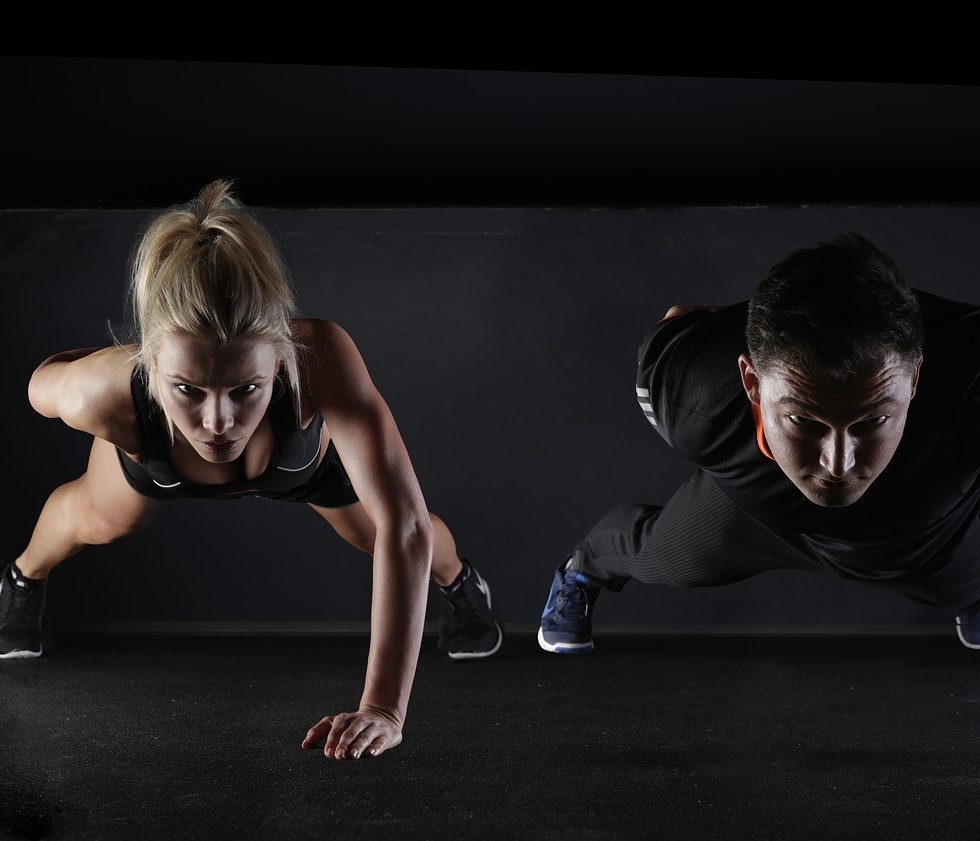 Men and women doing push-up