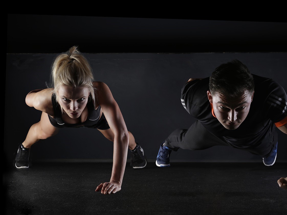 Men and women doing push-up